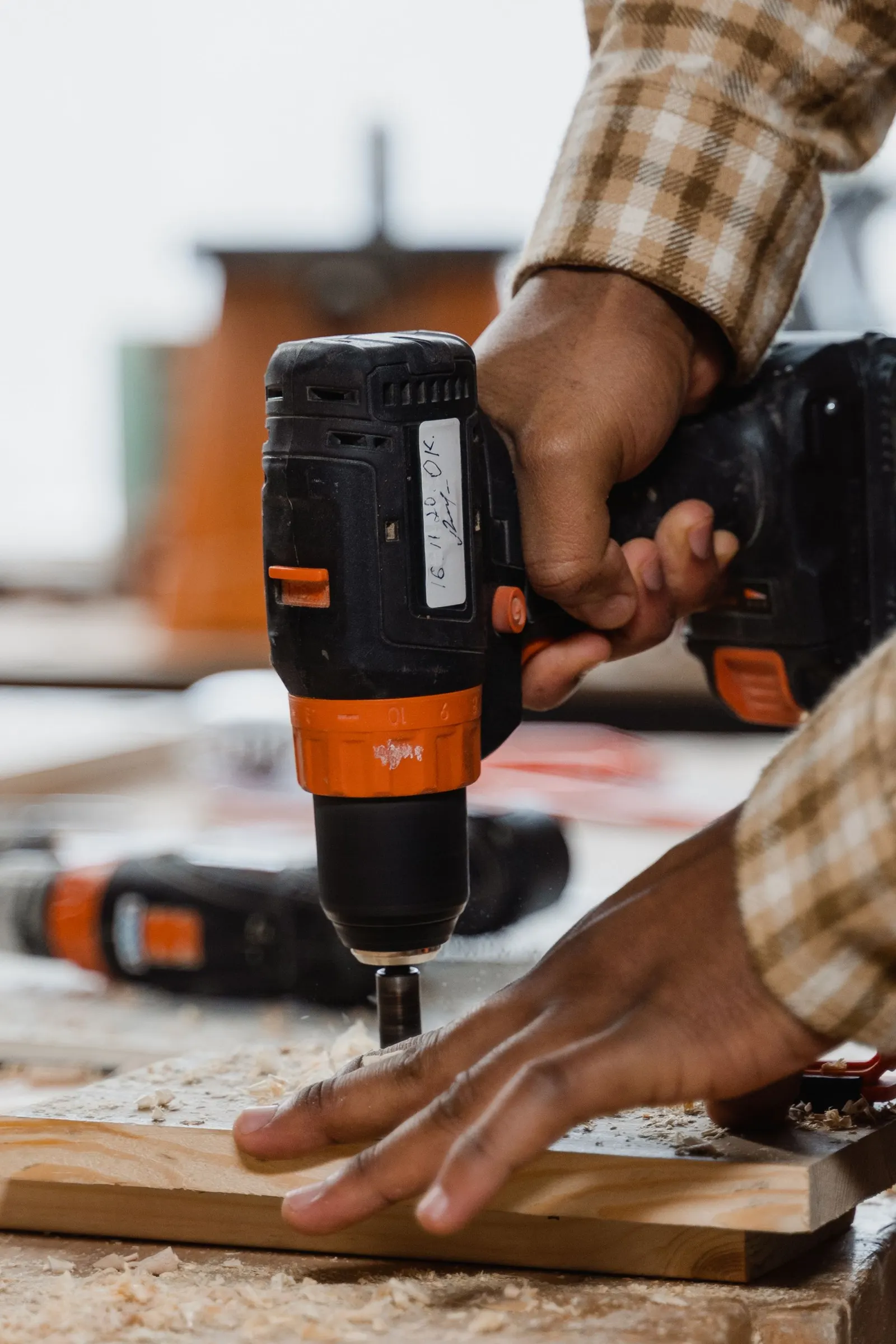 Cordless power drill in use